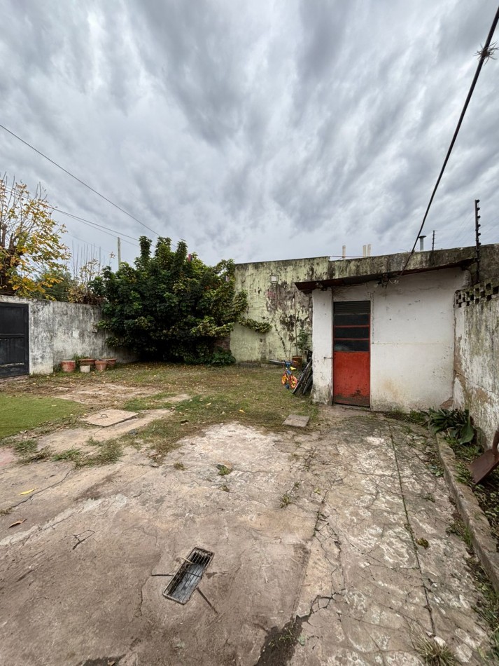 CASA CON LOTE EN MUÑIZ 