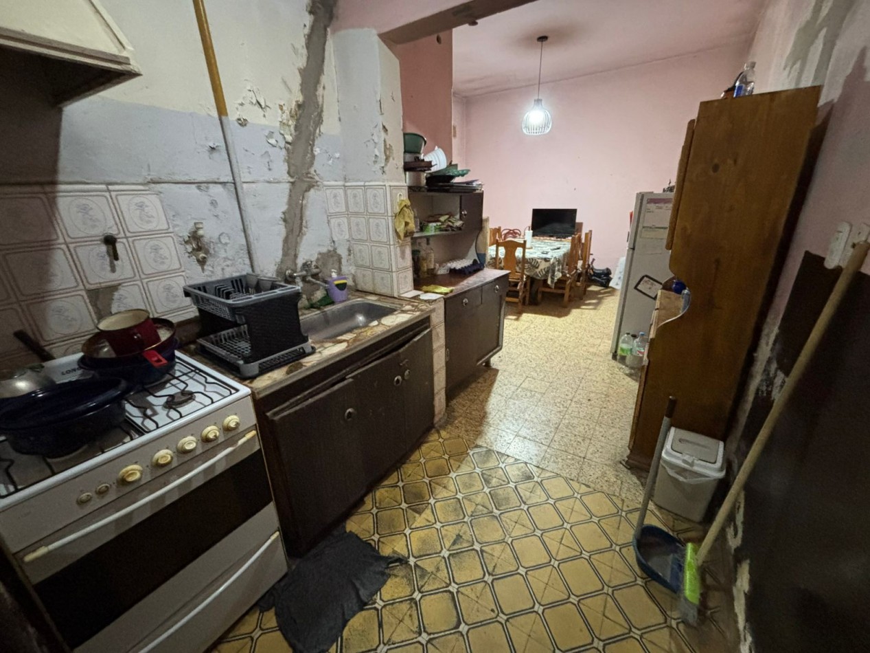 CASA CON LOTE EN MUÑIZ 