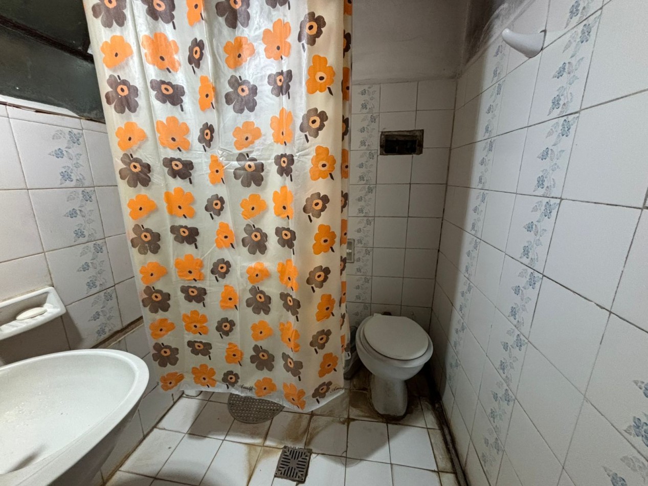 CASA CON LOTE EN MUÑIZ 